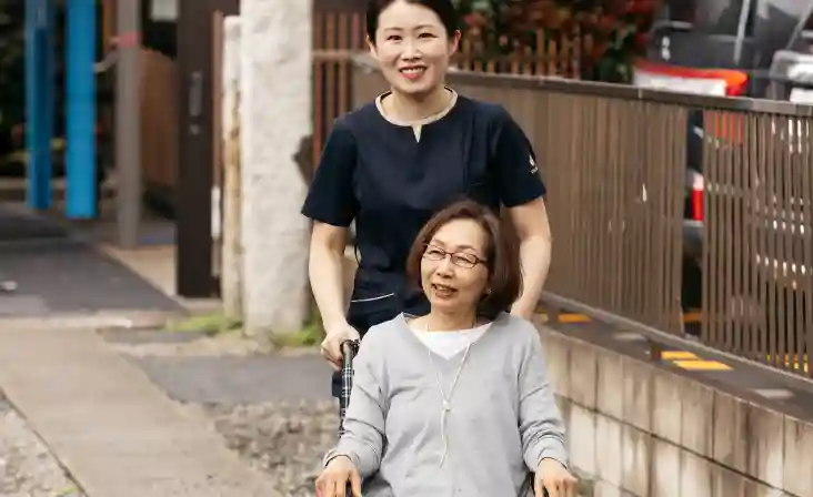Smiling patient and nurse